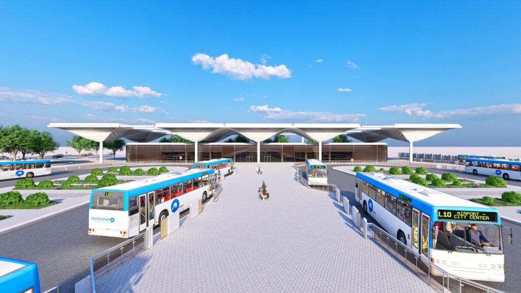 a rendering of a bus station with buses parked in front of it.