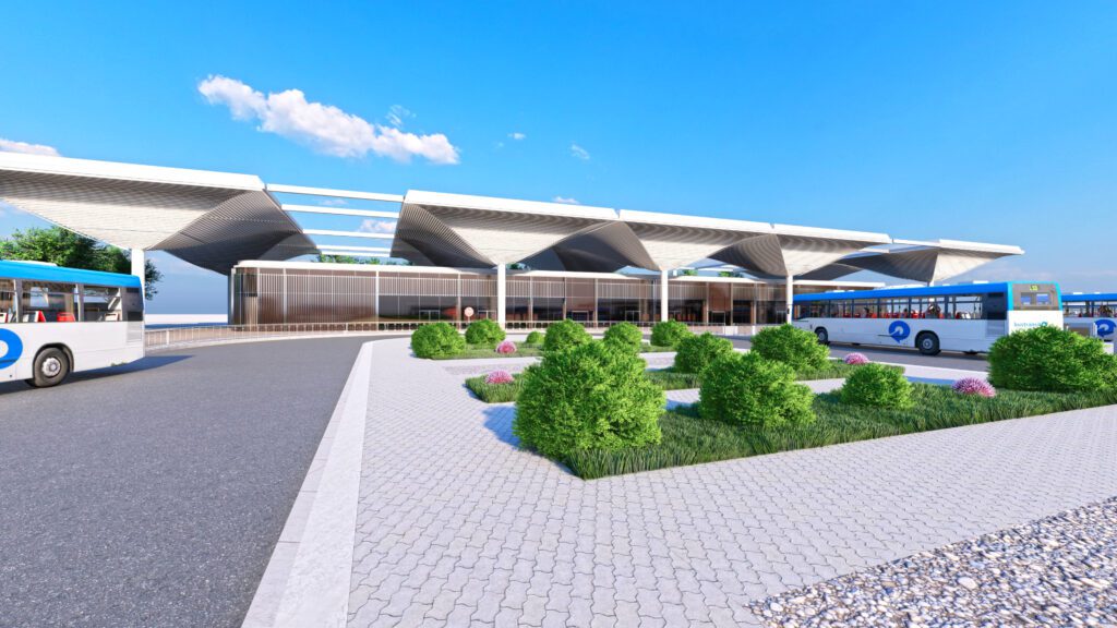 a rendering of a bus station with buses parked in front of it.