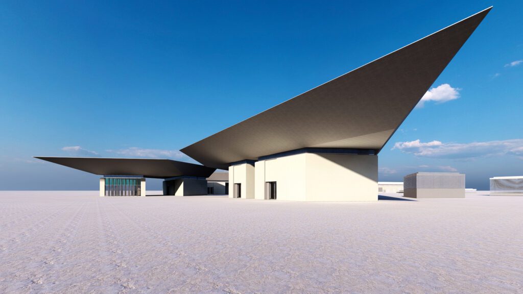 a building in the middle of a desert.