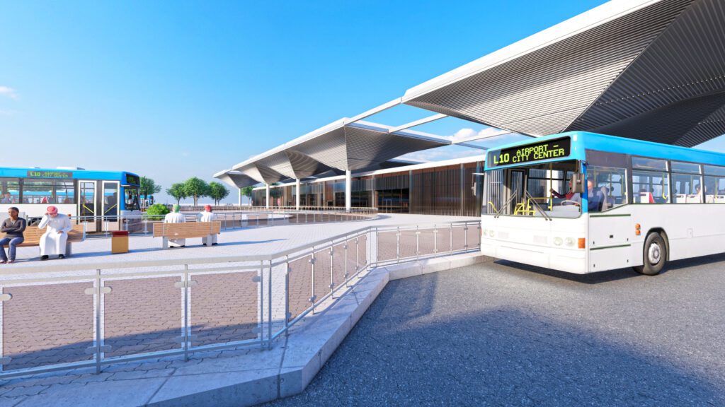 a blue and white bus is parked in front of a building.