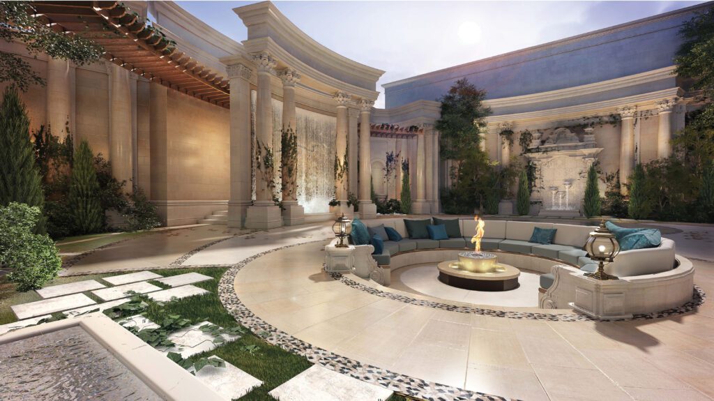 a large outdoor area with a fountain and couches.