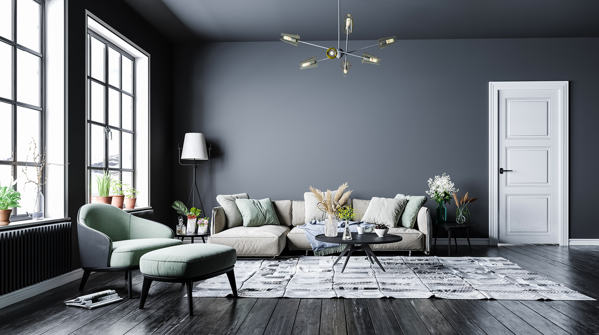 a living room with grey walls and wooden floors.